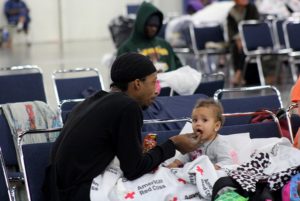 A lot of families were displaced into the George R. Brown Convention Center. Photo by Doogie Roux.