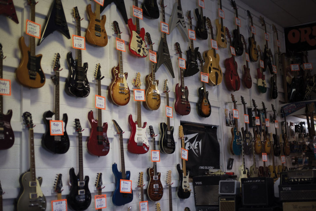 Our critic is still amazed by Zoo Music, the “gold standard for local instrument shops.” Photo by Cheyenne Hammons.