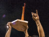 Roger Clemens and Matthew McConaughey hoist the Red River softball trophy