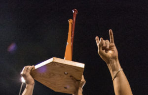 Roger Clemens and Matthew McConaughey hoist the Red River softball trophy