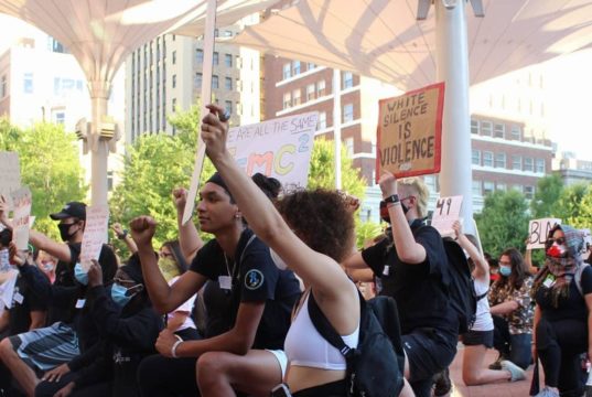 Protest Group Answers Recent Arrests With Silent March