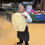 Chef Chris Vasquez showed off the 26-inch-wide tortilla used for the Boomstick Burrito.