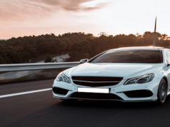 Extended warranty brochure on car dashboard