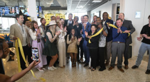 Simone Biles Taste of Gild ribbon cutting