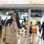 Simone Biles bites medal