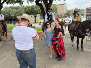 pose for photos wth horses